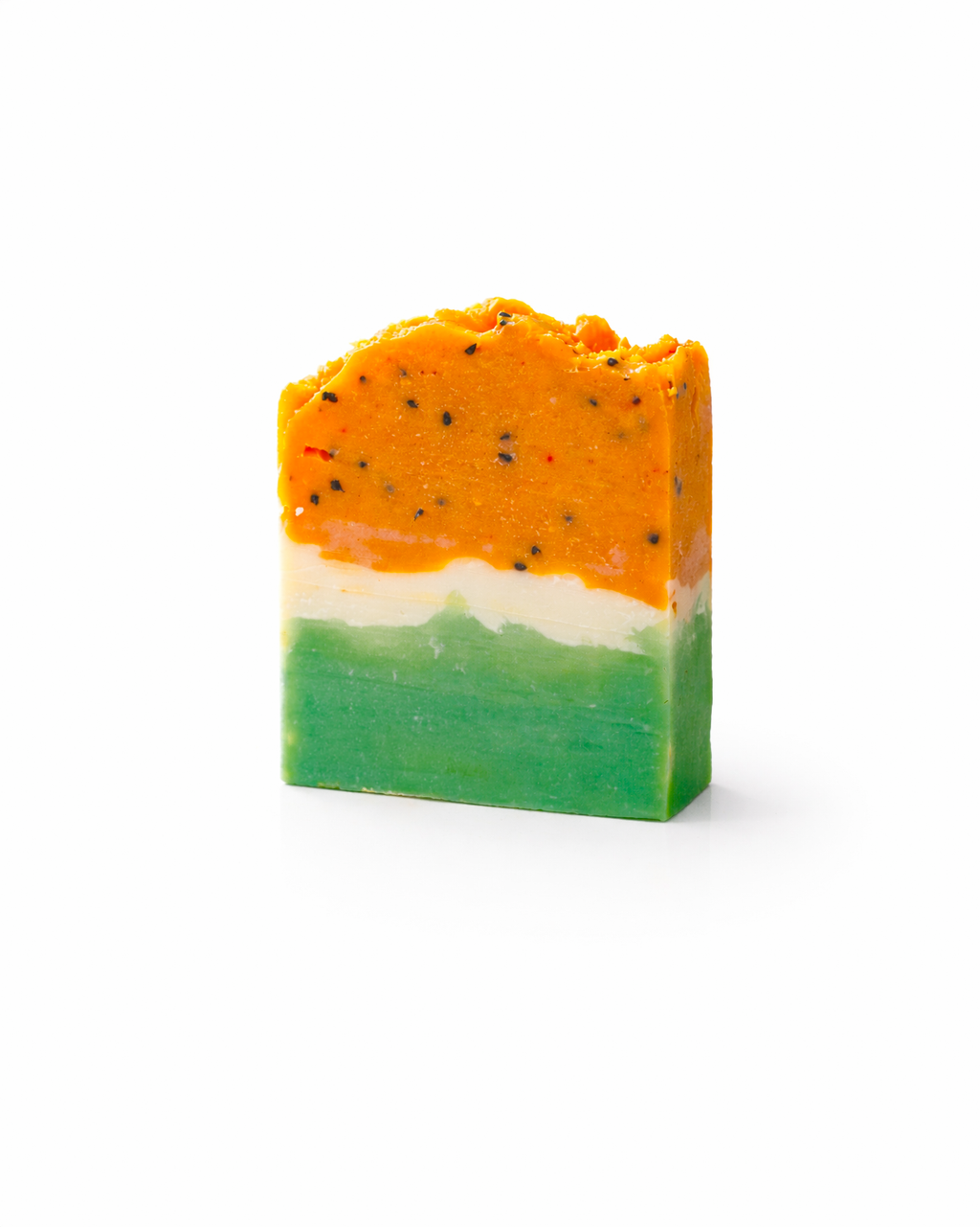 Three-layered soap bar with orange, white, and green colors on a white background